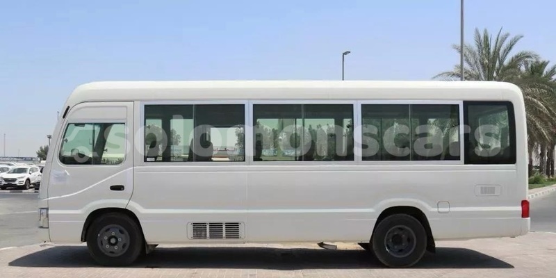 Big with watermark toyota coaster isabel barora island 1257